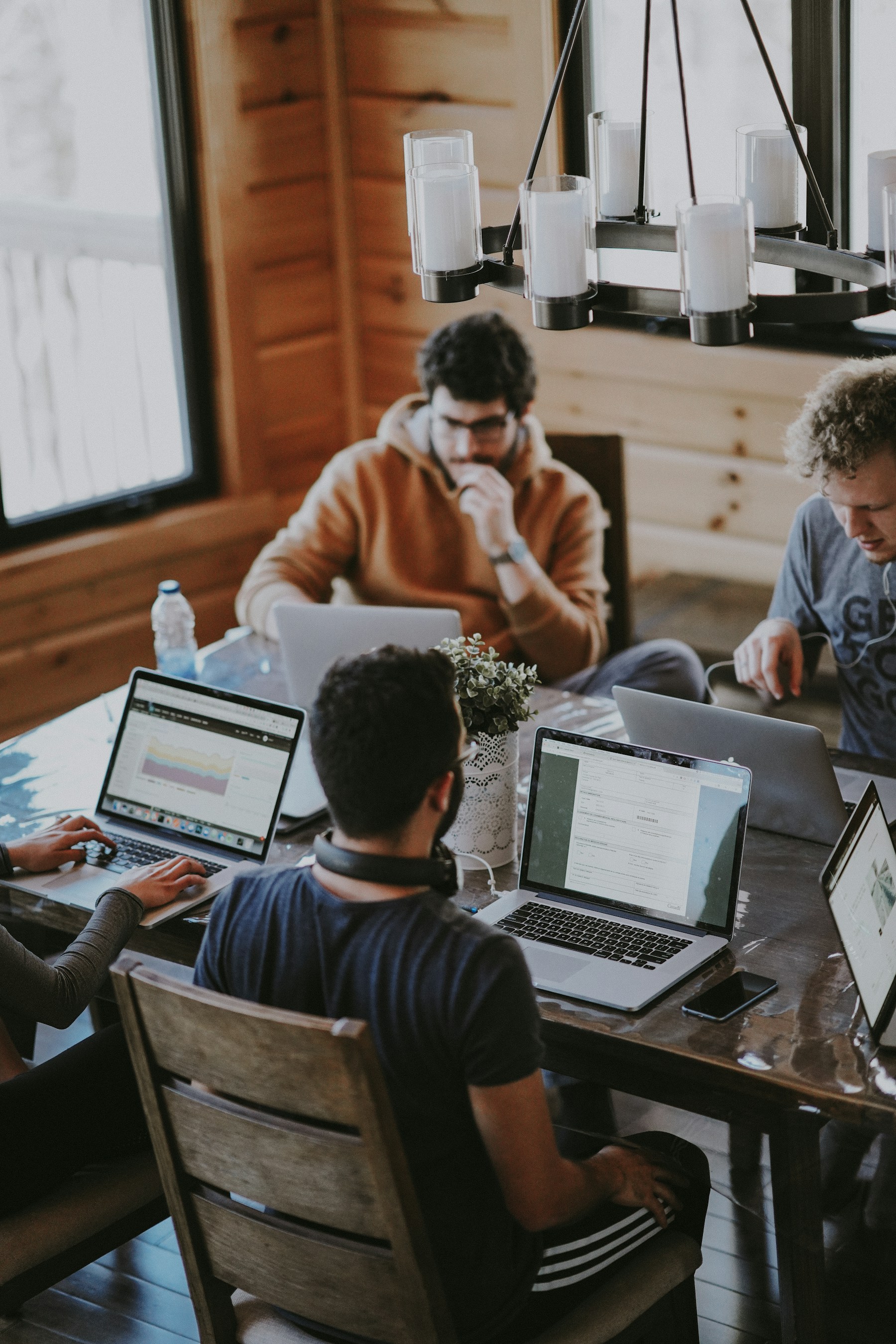 A collaborative team working around a shared table